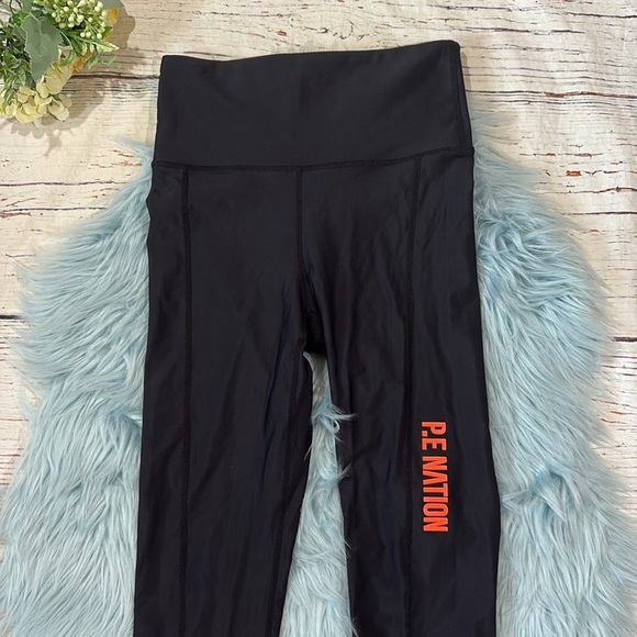 P.E Nation Score Runner High Rise Legging in Black - Picture 3 of 8